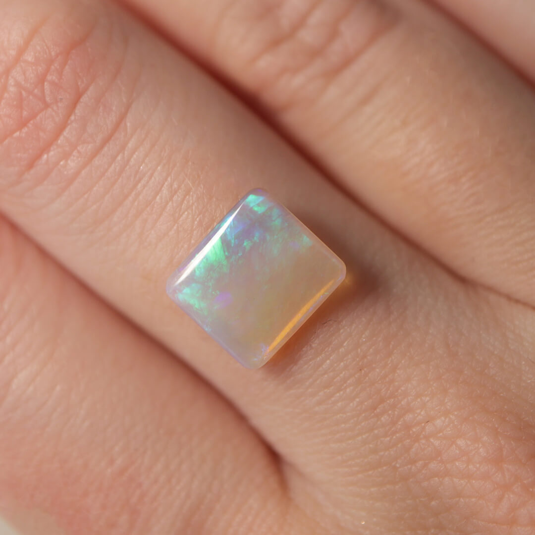 1.75ct Dark Crystal Opal - 9 x 10.5 x 2.2 mm