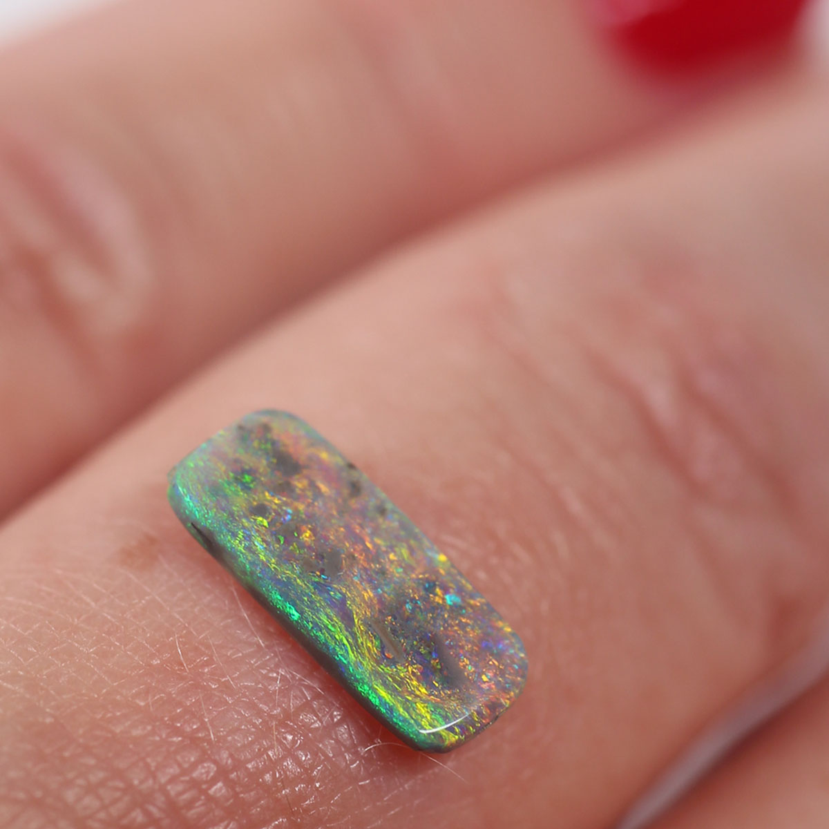0.78ct Dark Opal - 4.7 x 11 x 1.8mm