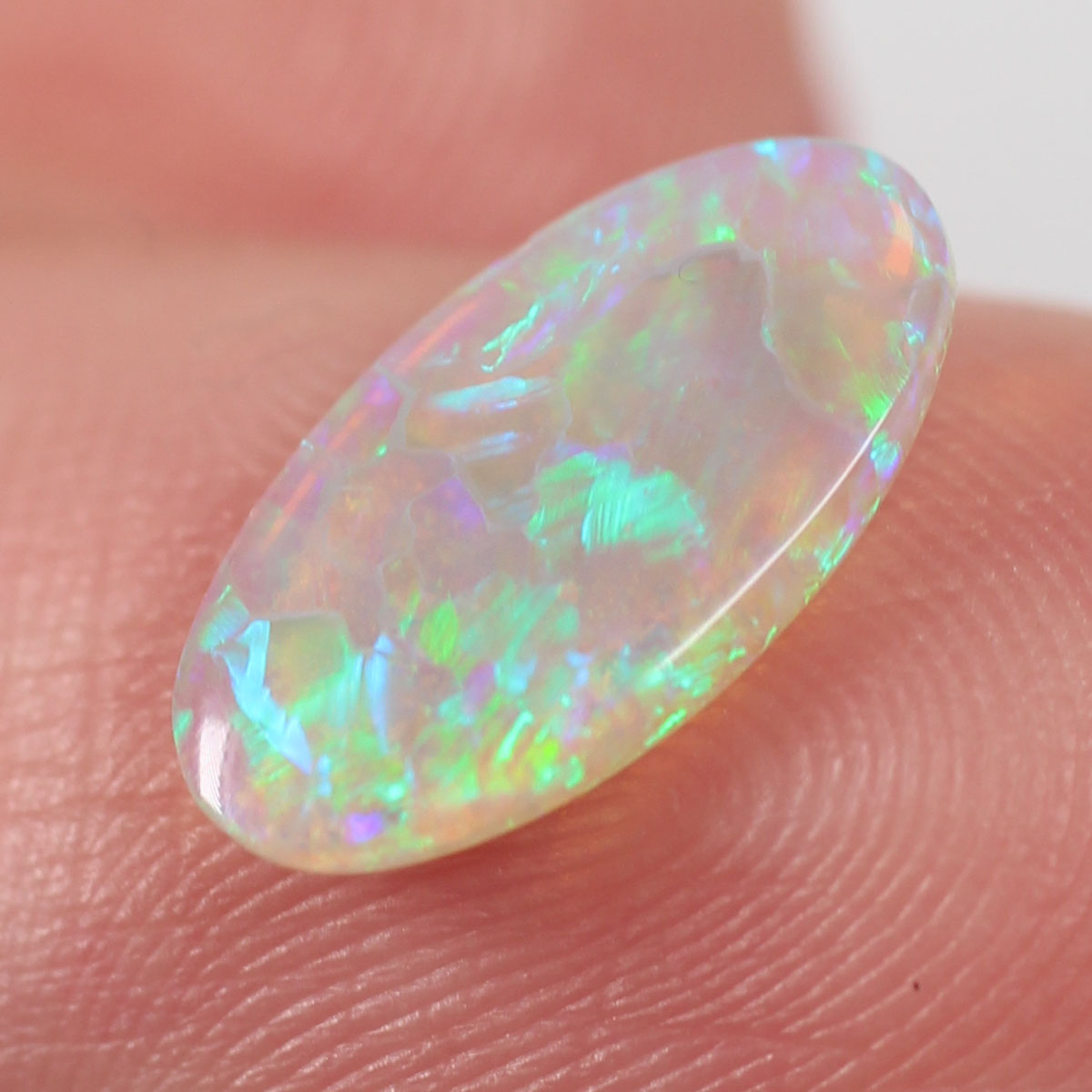 0.85ct Dark Crystal Opal - 6.5 x 11.7 x 2mm