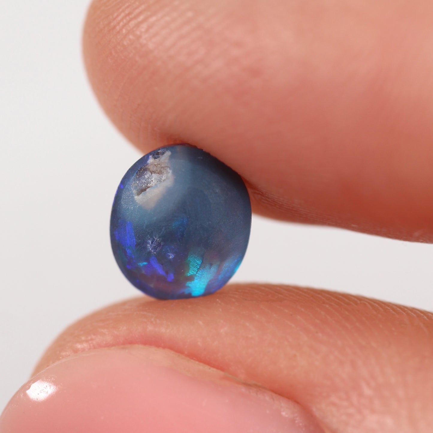 1.23ct Black Opal - 6.7 x 7.8 x 4.10mm