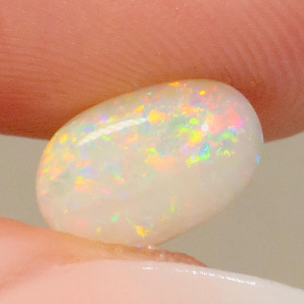 1.64ct Light Opal - 7 x 11 x 3mm