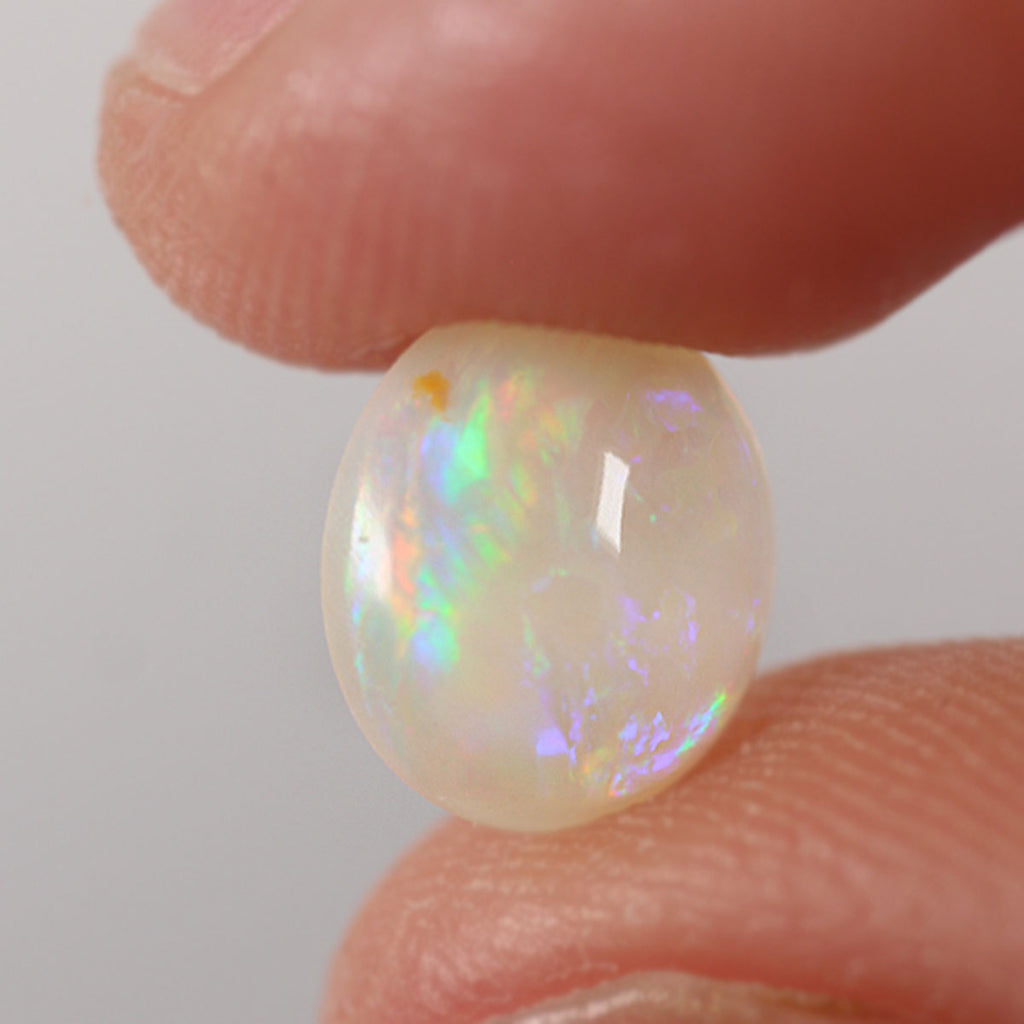 1.25ct Australian light opal shown for size comparison