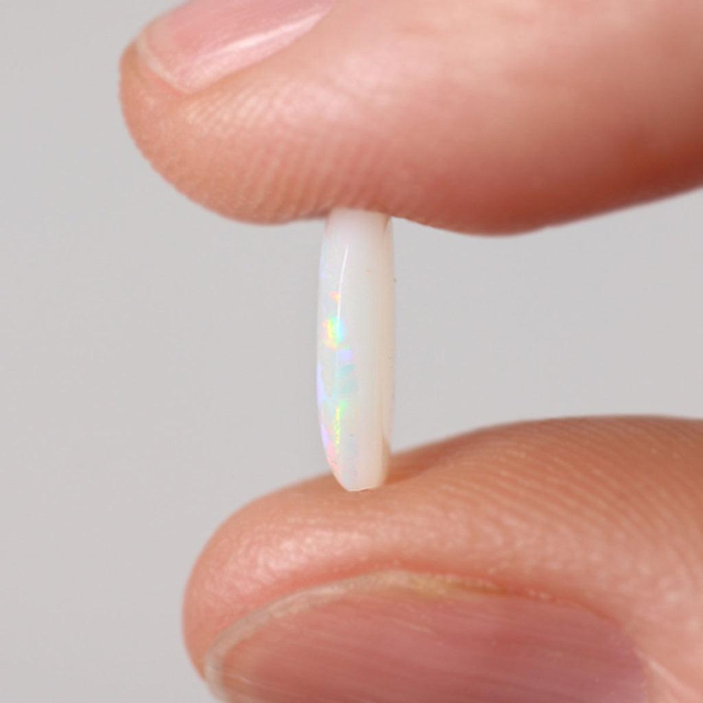 1.16ct light opal shown under rolling light