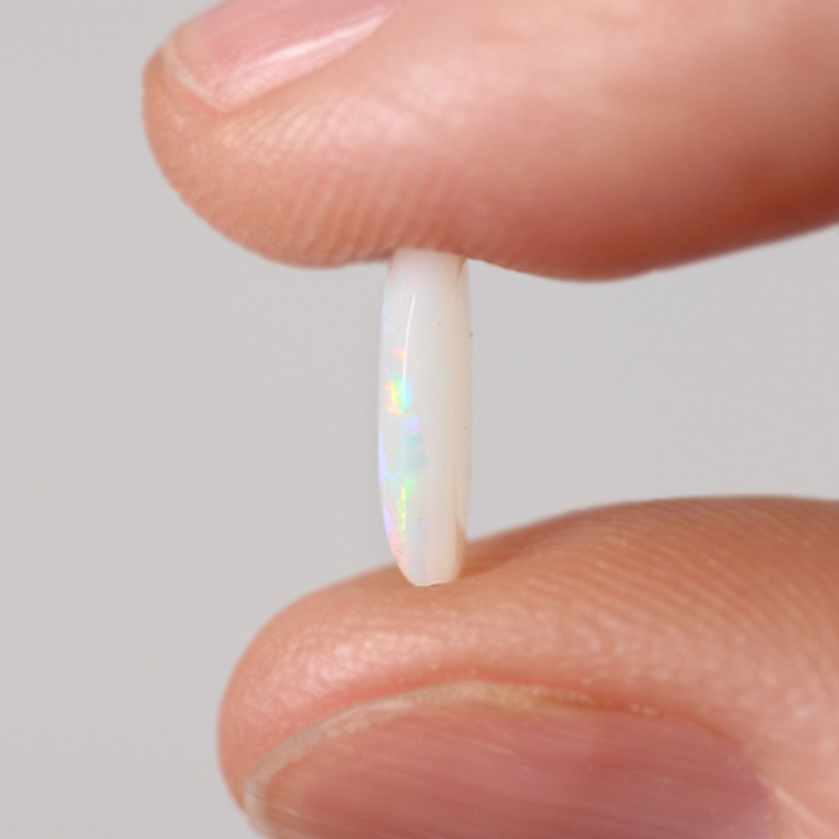 1.16ct light opal shown under rolling light