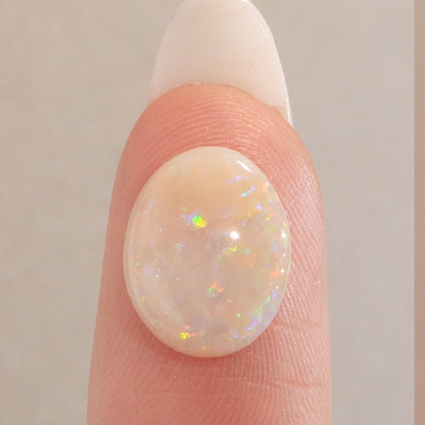 3.87ct Light Opal - 10.5 x 13 x 4mm