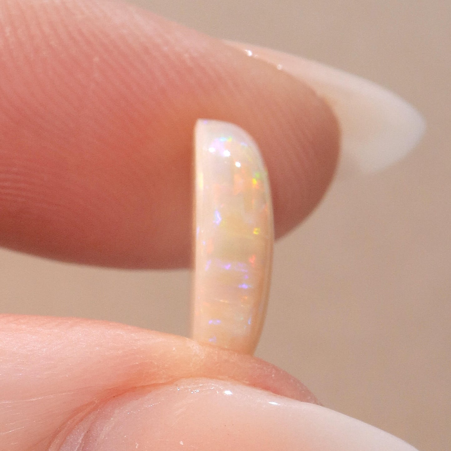 3.87ct Light Opal - 10.5 x 13 x 4mm