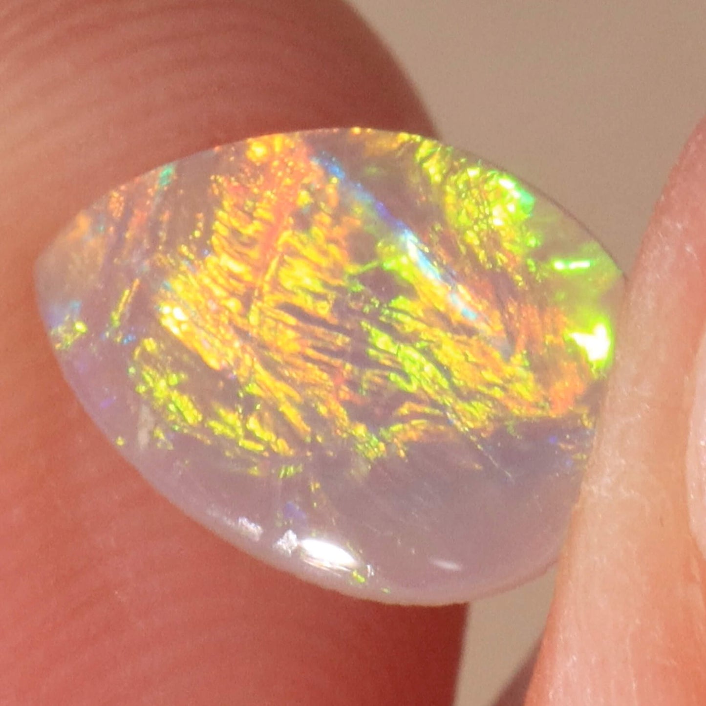 0.50ct Dark Crystal Opal - 7 x 9.5 x 1.5 mm