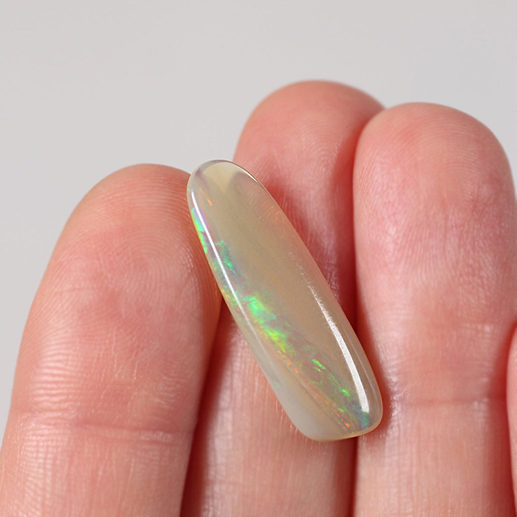 Dark crystal opal alternate angle showing foil flash play