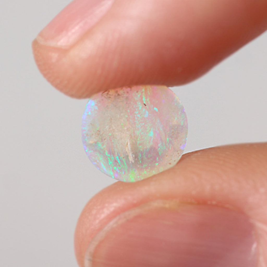 Close detail of foil flash pattern on light crystal opal