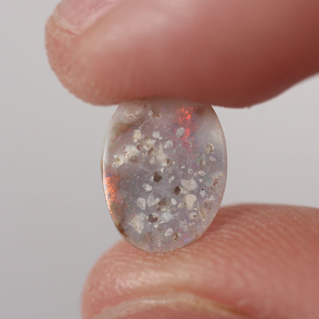 Extra view of Australian dark opal with orange-green flash