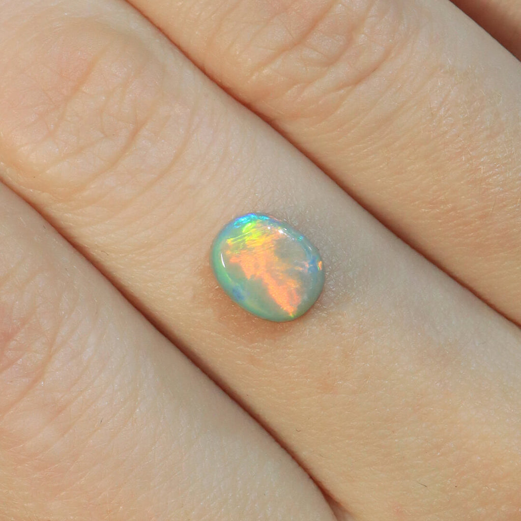 1.77ct Dark Opal - 7 x 9 x 4mm