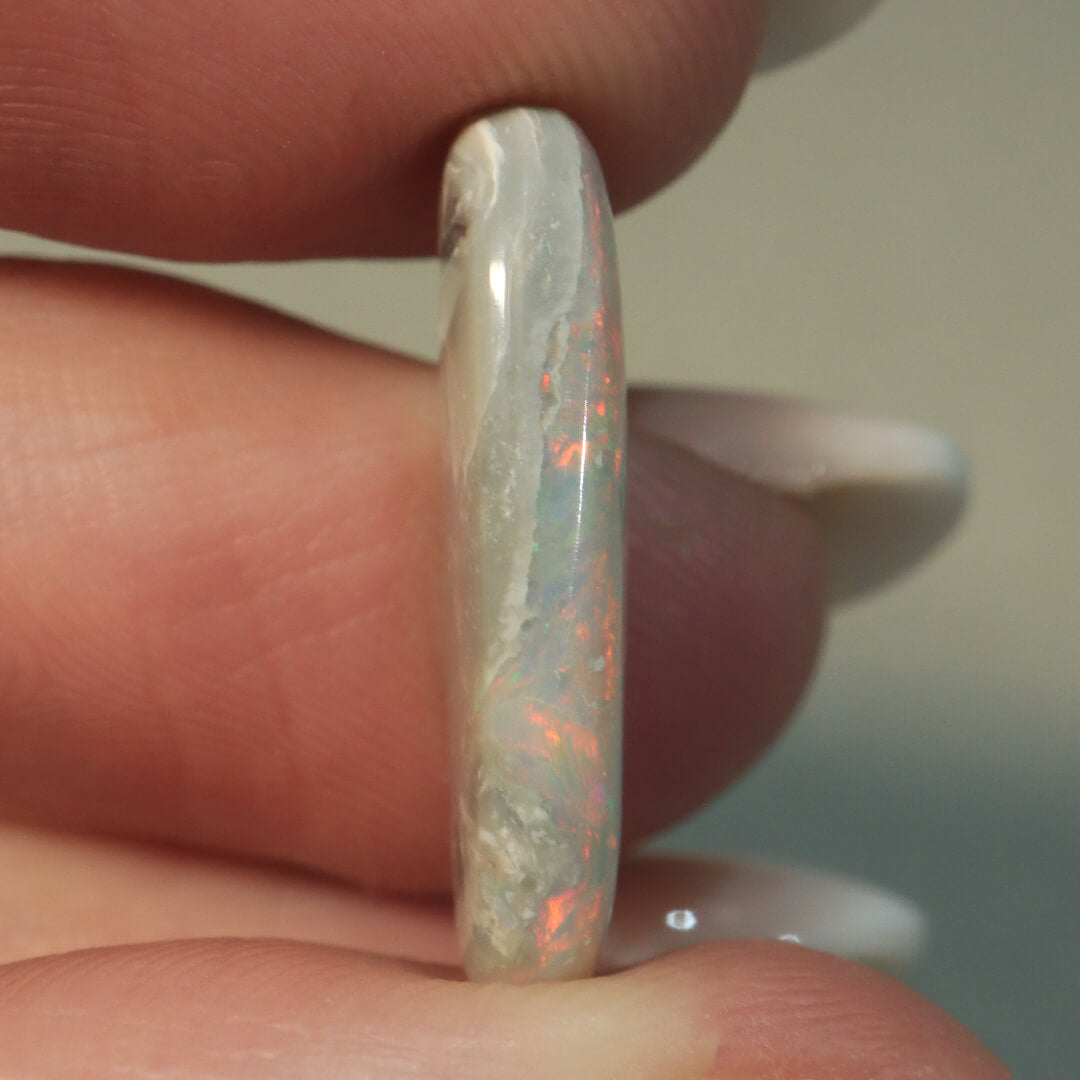 5.73ct Dark Opal - 9 x 21.5 x 4mm