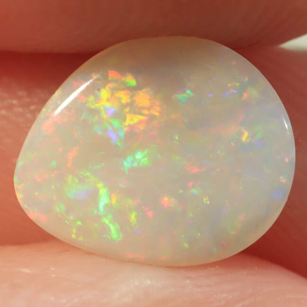 0.9ct Australian light opal cabochon with orange-purple floral