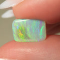 1.5ct Australian dark crystal opal shown for size comparison