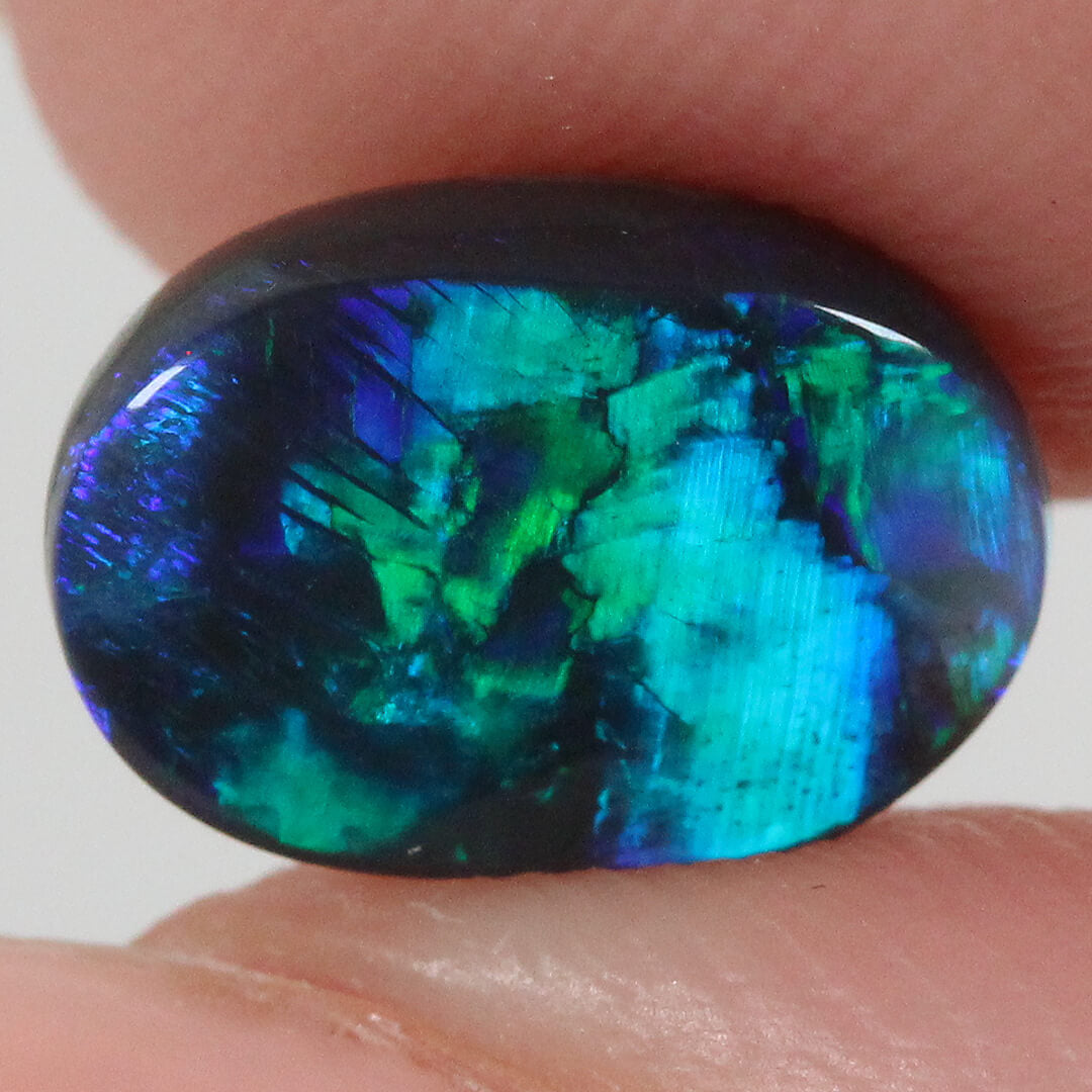 2.19ct Black Opal - 7 x 10 x 4.5 mm