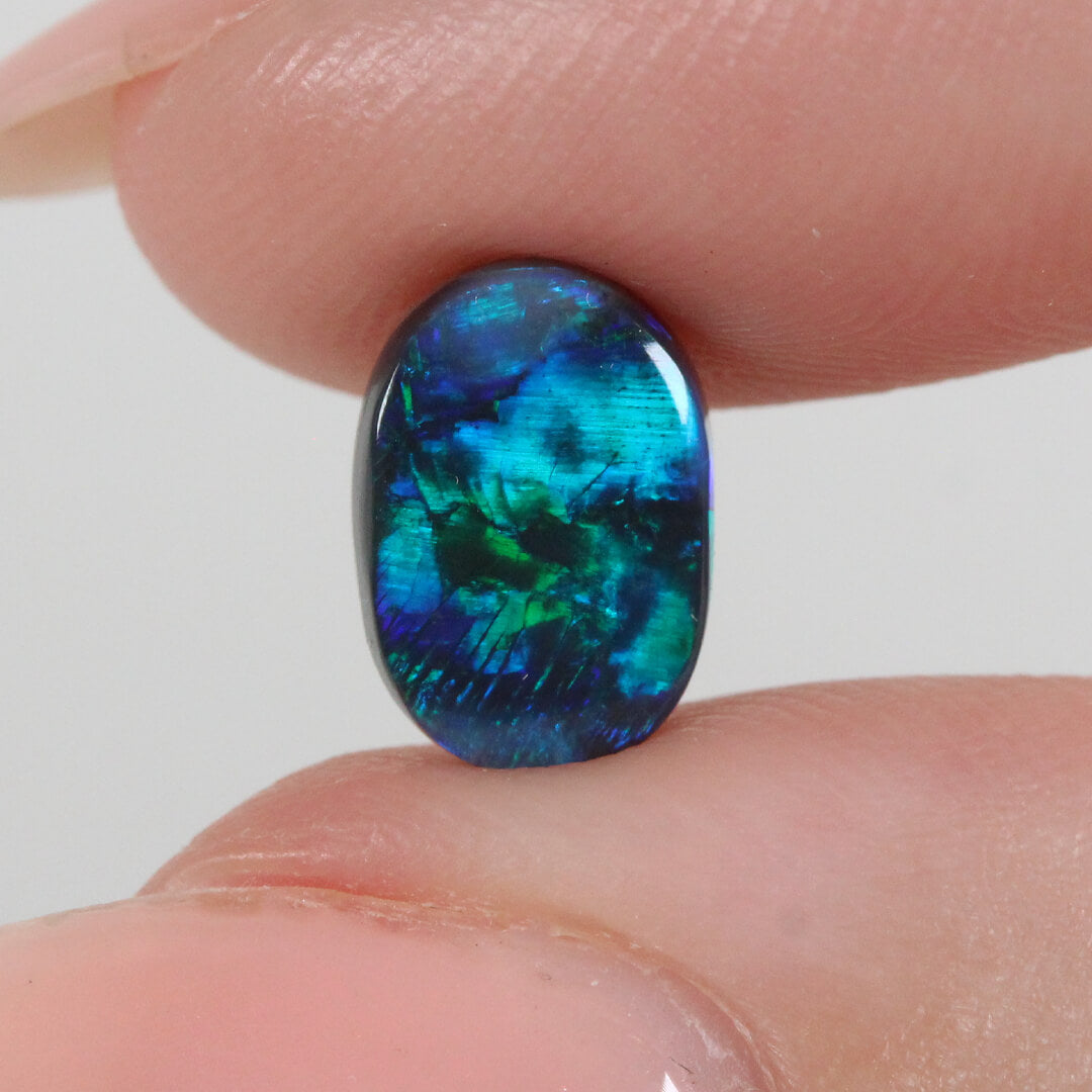 2.19ct Black Opal - 7 x 10 x 4.5 mm