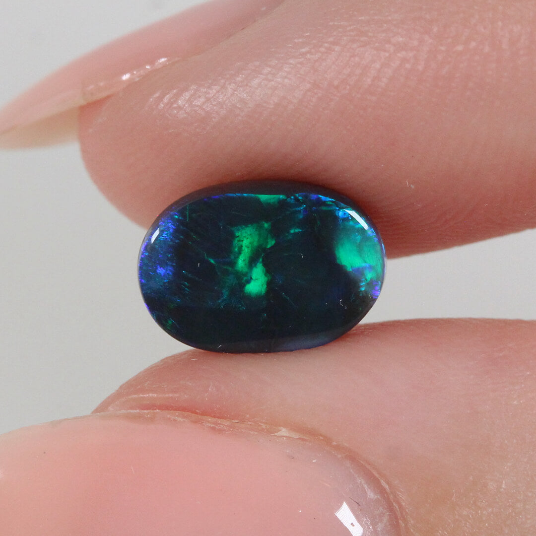 2.19ct Black Opal - 7 x 10 x 4.5 mm