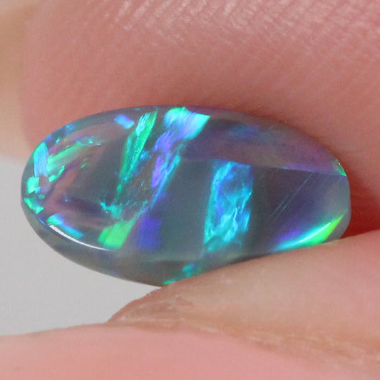 0.94ct Black Crystal Opal - 6 x 9.5 x 2.5 mm