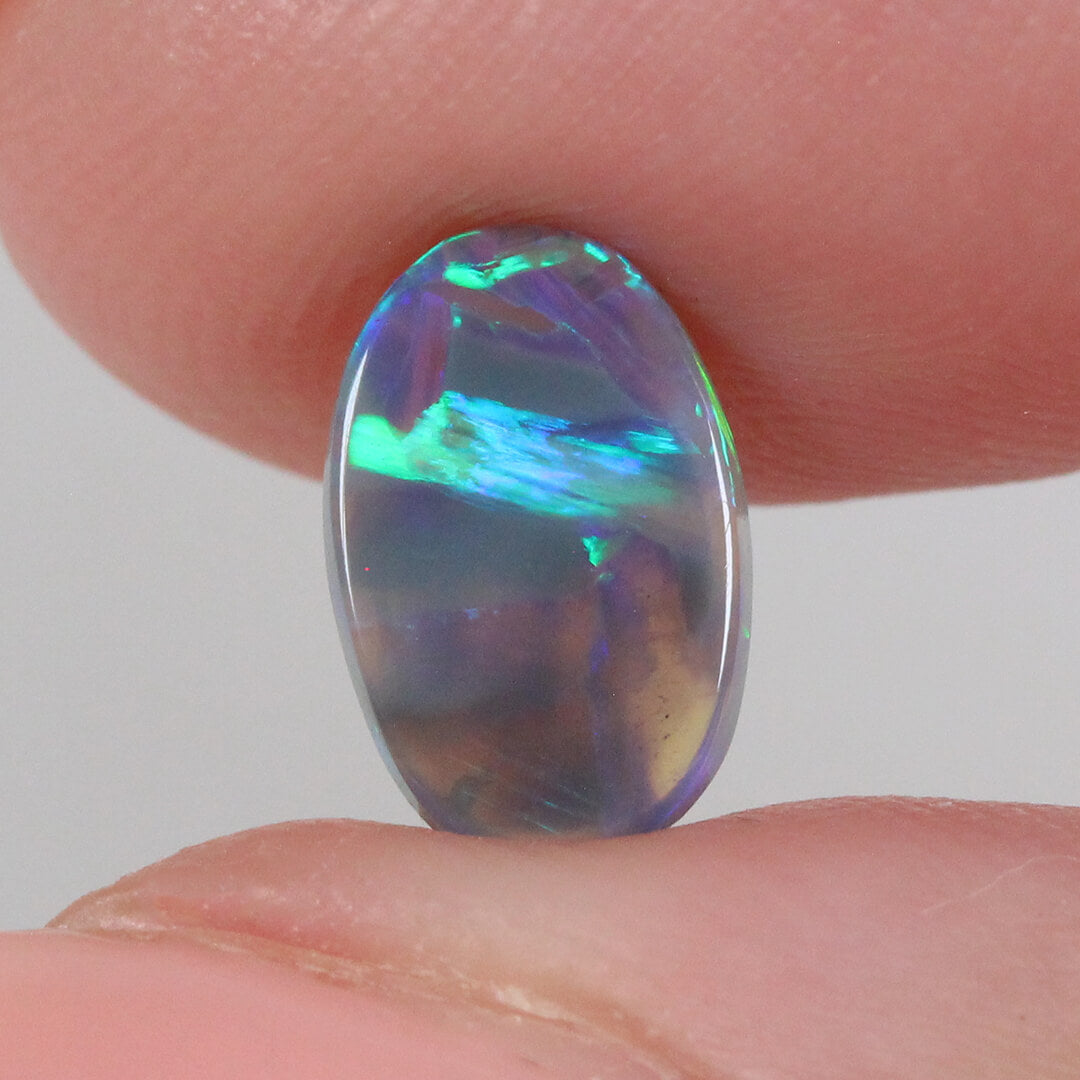 0.94ct Black Crystal Opal - 6 x 9.5 x 2.5 mm