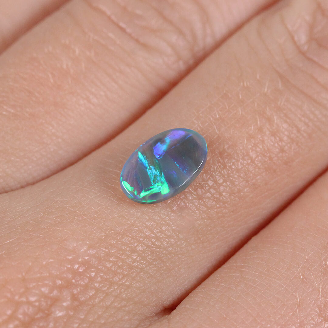 0.94ct Black Crystal Opal - 6 x 9.5 x 2.5 mm