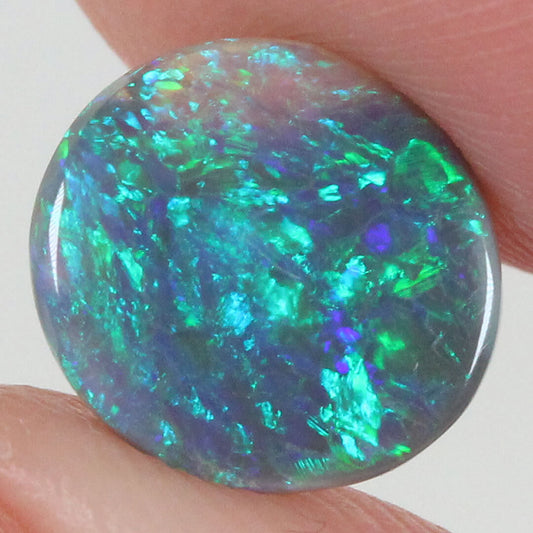 1.21ct Black Opal - 8.5 x 9 x 2mm