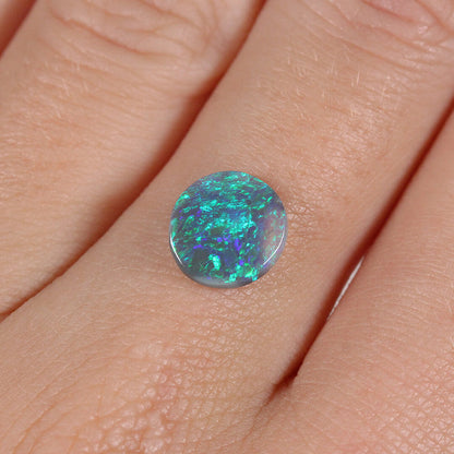 1.21ct Black Opal - 8.5 x 9 x 2mm