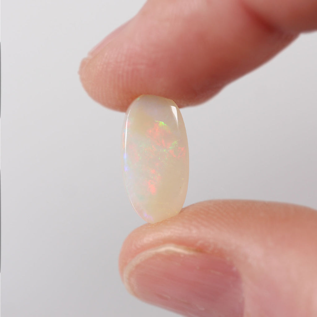 Pattern detail showing foil flash on 2.05ct light opal