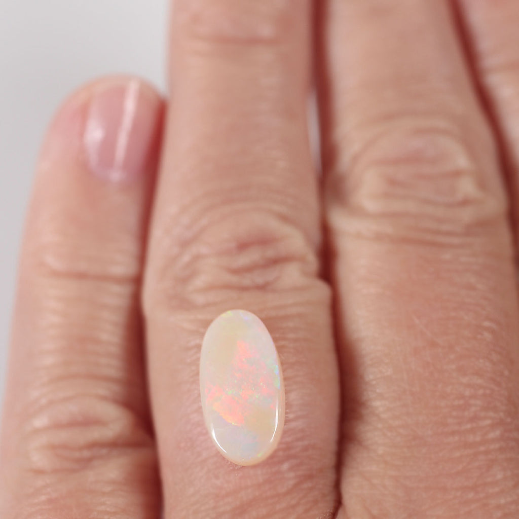 Side profile of 2.05ct light opal showing natural solid body