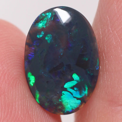 2.42ct Black Opal - 9.5 x 13.5 x 3mm