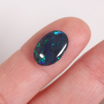 2.42ct Black Opal - 9.5 x 13.5 x 3mm