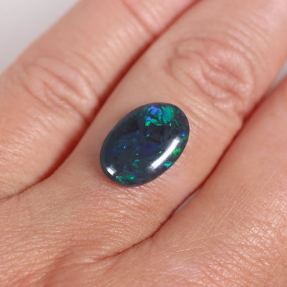 2.42ct Black Opal - 9.5 x 13.5 x 3mm