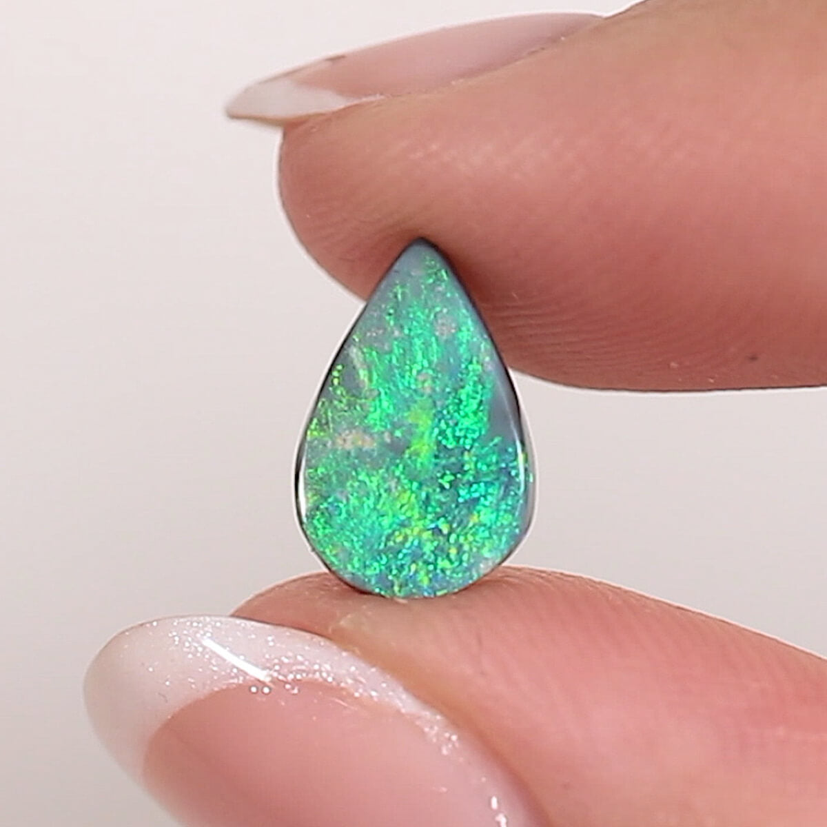 1.48ct Black Opal - 7.5 x 11 x 2.5mm