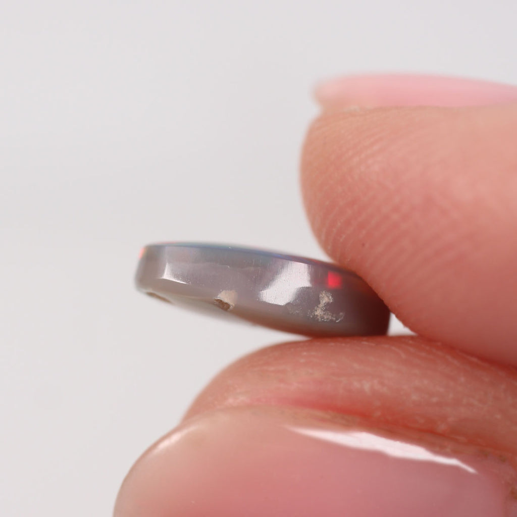 1.64ct Dark Opal - 6.5 x 11 x 3.3mm