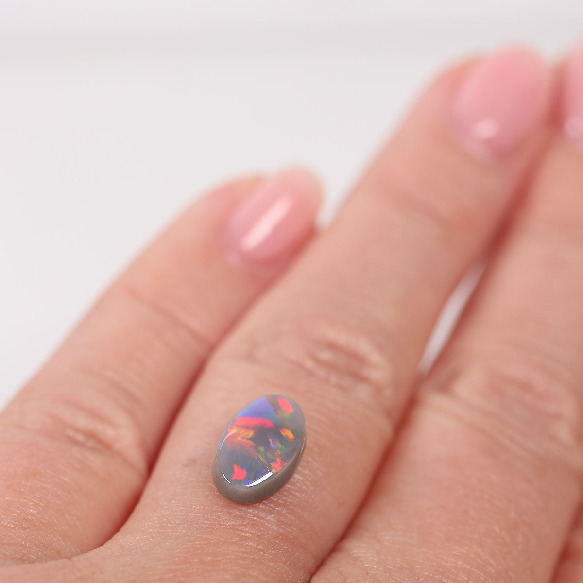1.64ct Black Opal - 6.5 x 11 x 3.3mm