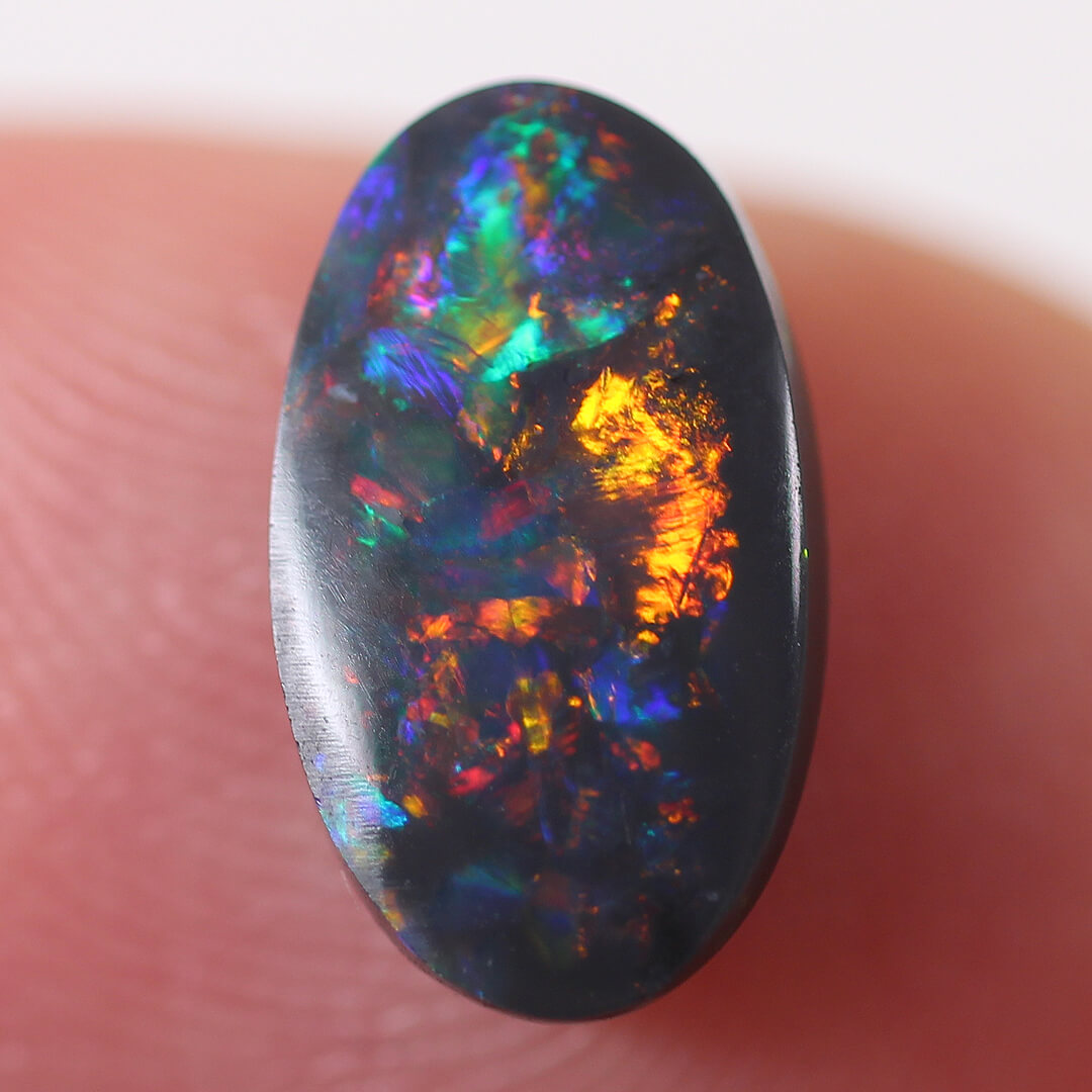 1.10ct Black Opal - 6 x 10.5 x 2.5mm