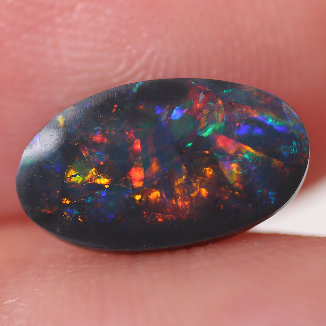 1.10ct Black Opal - 6 x 10.5 x 2.5mm