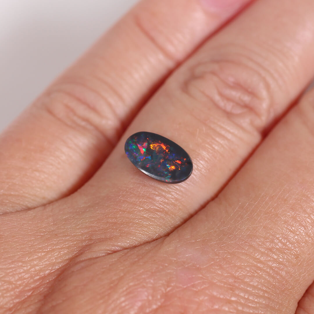 1.10ct Black Opal - 6 x 10.5 x 2.5mm