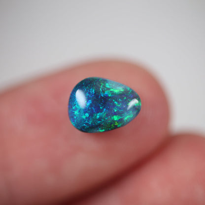 1.60ct Black Opal - 7 x 9.5 x 3.5mm