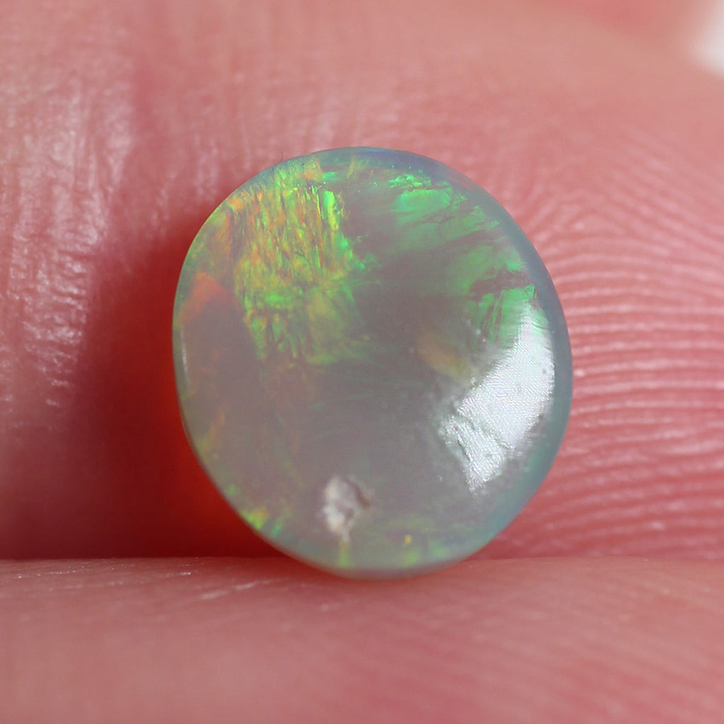 1.08ct Dark Opal - 7 x 8 x 3mm