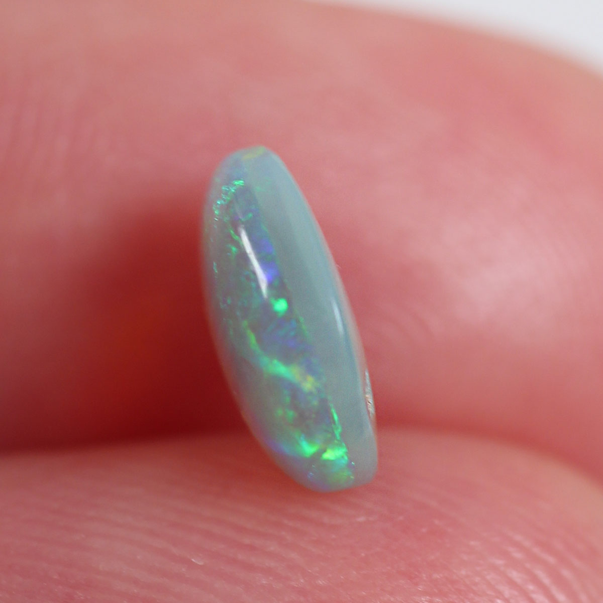1.08ct Dark Opal - 7 x 8 x 3mm