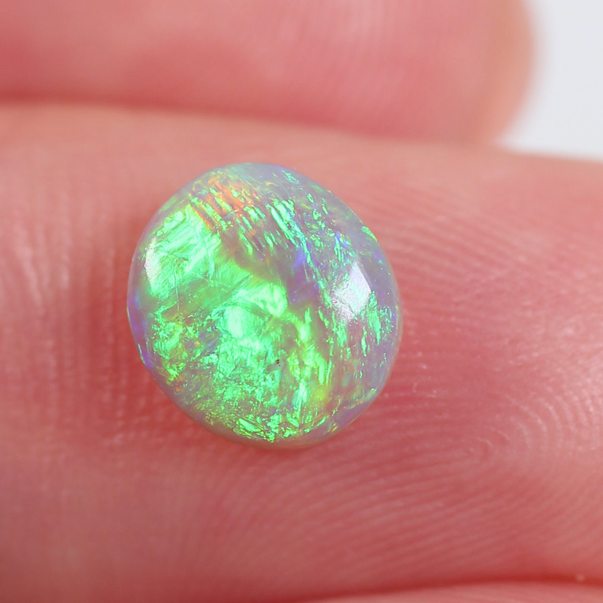 1.08ct Dark Opal - 7 x 8 x 3mm