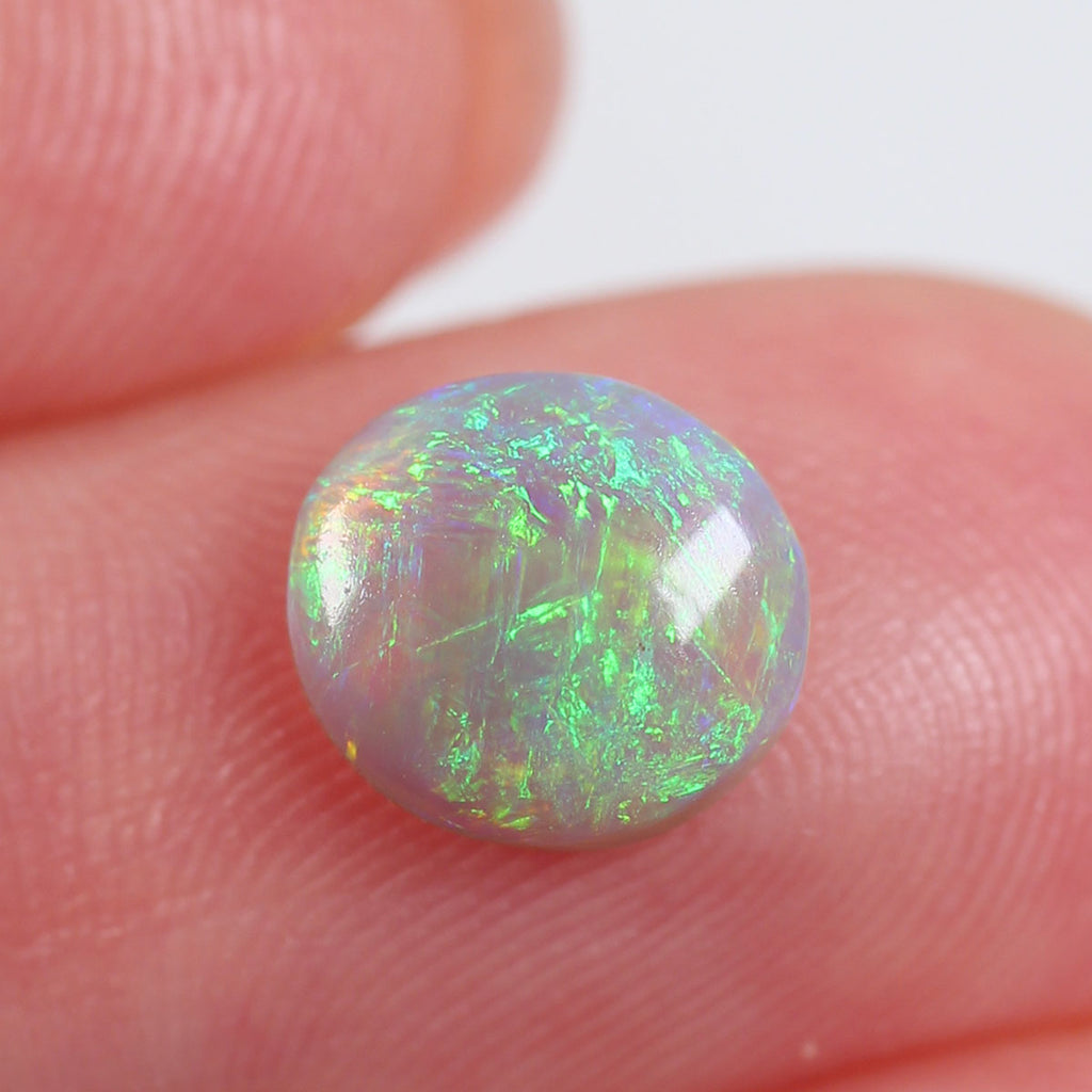 1.08ct Dark Opal - 7 x 8 x 3mm