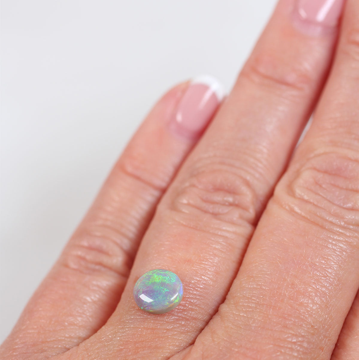 1.08ct Dark Opal - 7 x 8 x 3mm