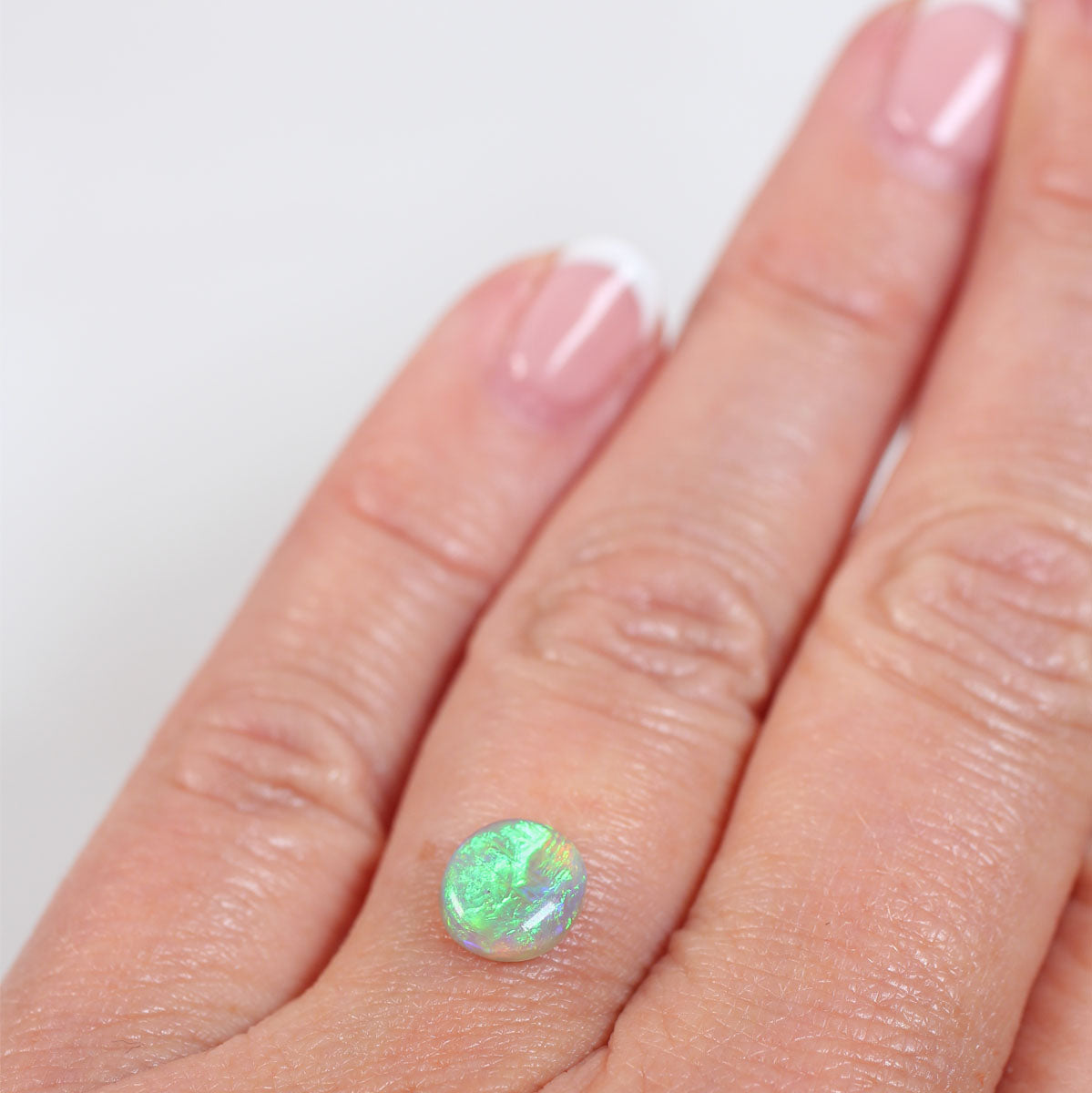 1.08ct Dark Opal - 7 x 8 x 3mm