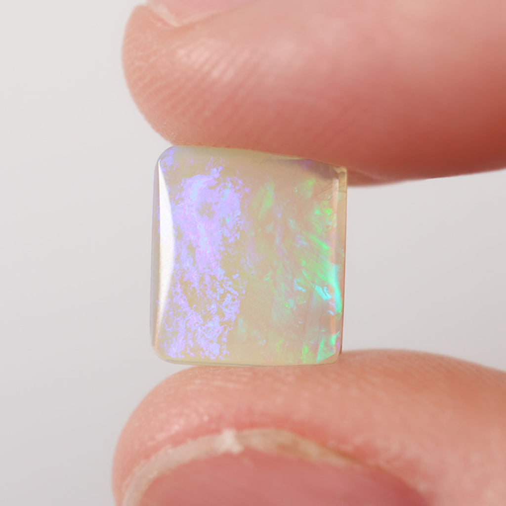 Crystal opal surface detail showing blue-green play-of-colour