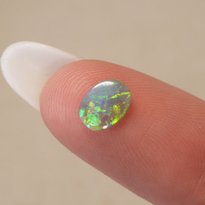 0.55ct Dark Crystal Opal - 5.5 x 7.5 x 2mm