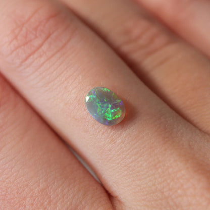 0.55ct Dark Crystal Opal - 5.5 x 7.5 x 2mm