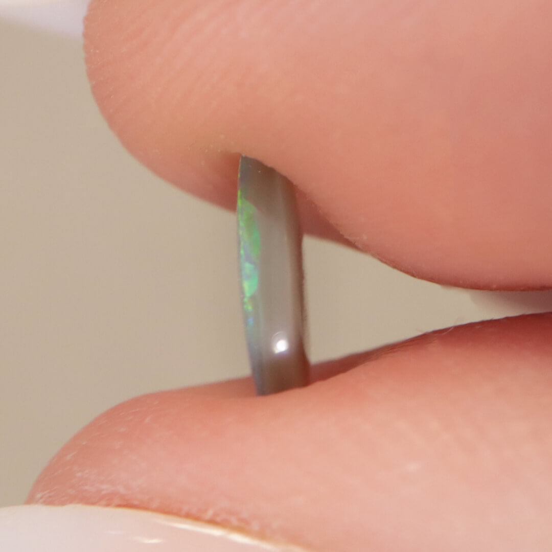 0.55ct Dark Crystal Opal - 5.5 x 7.5 x 2mm