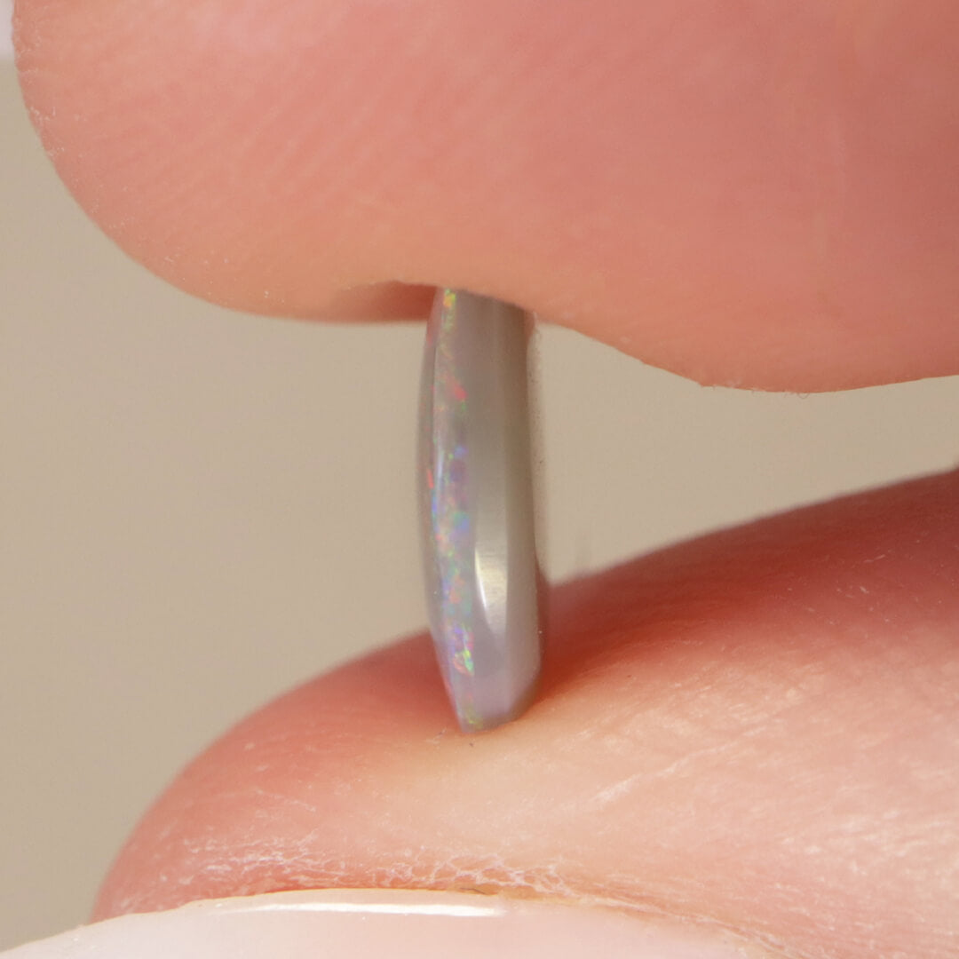 0.75ct Dark Opal - 6 x 8 x 2mm