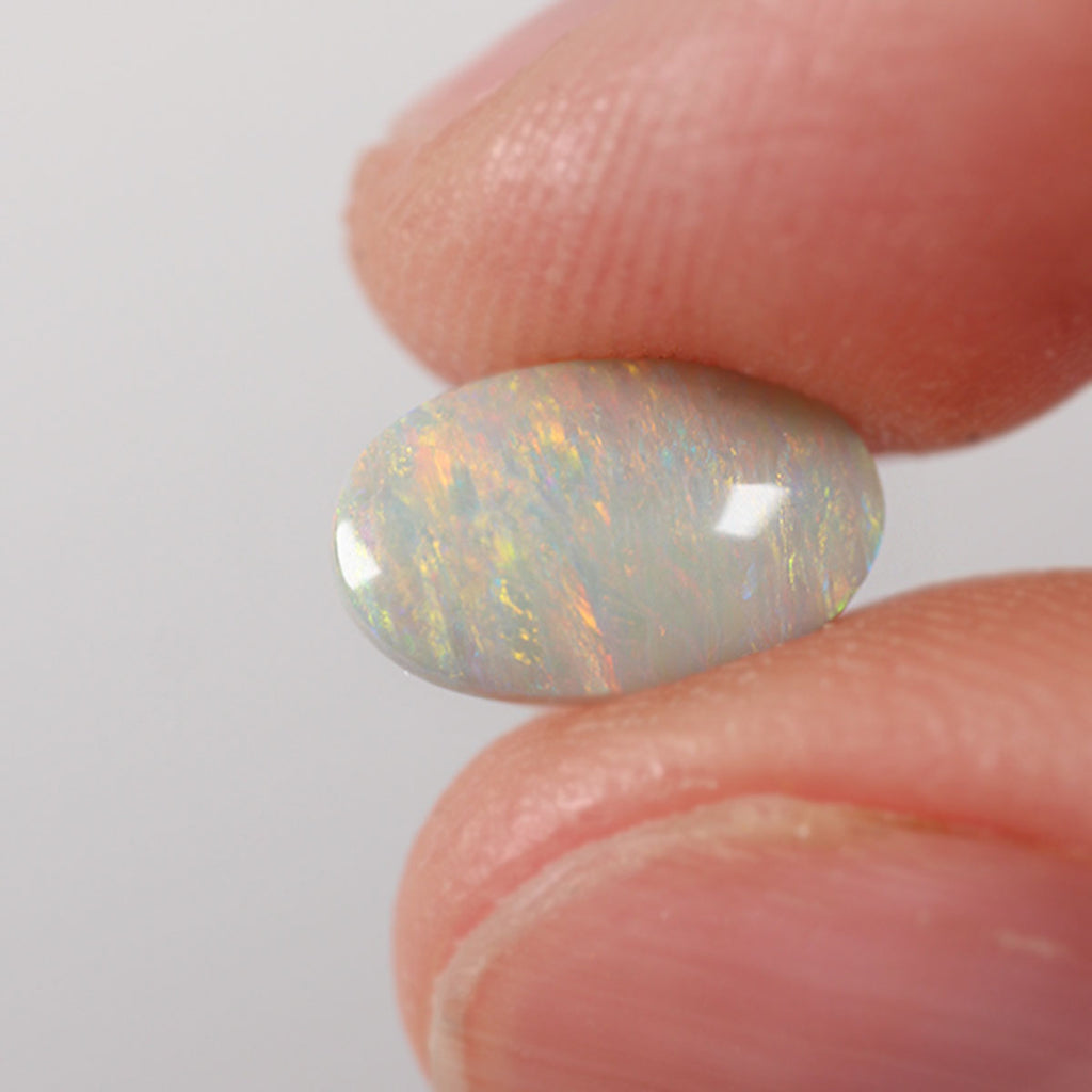 Close detail of foil flash pattern on dark opal